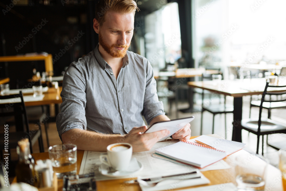 Businessman taking notes Businessman taking notes