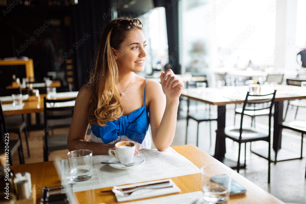 Beautiful woman enjoying her coffee Beautiful woman enjoying her coffee