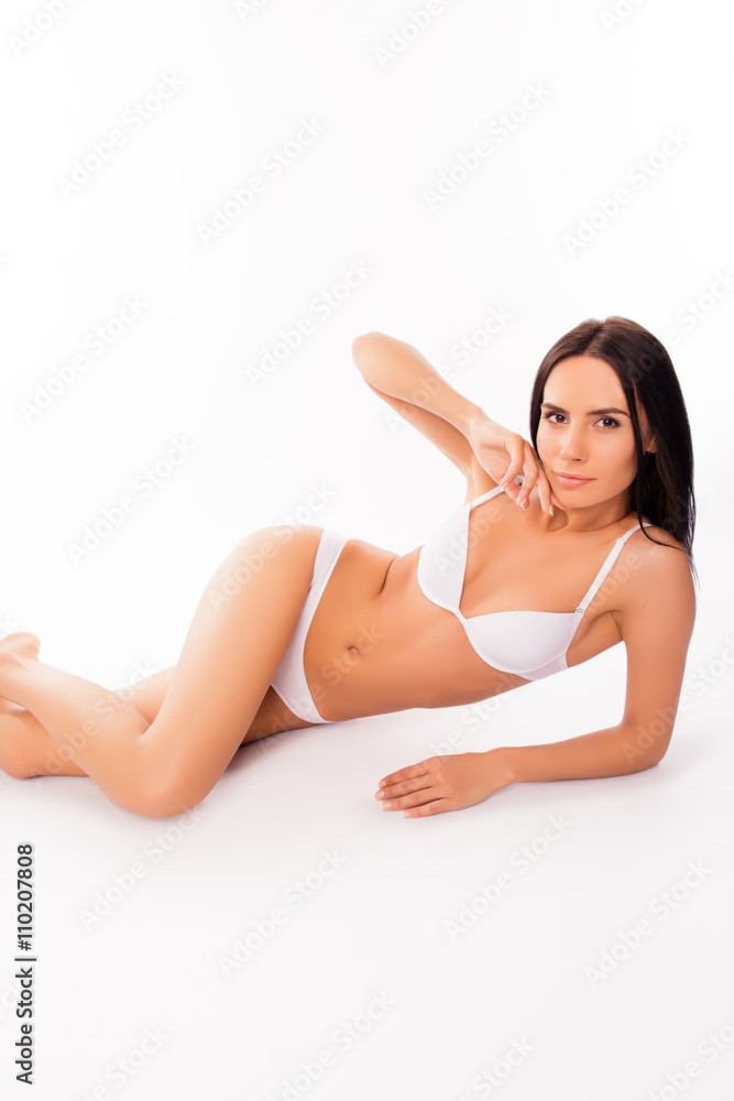 Pretty sexy slim fit woman in white underwear