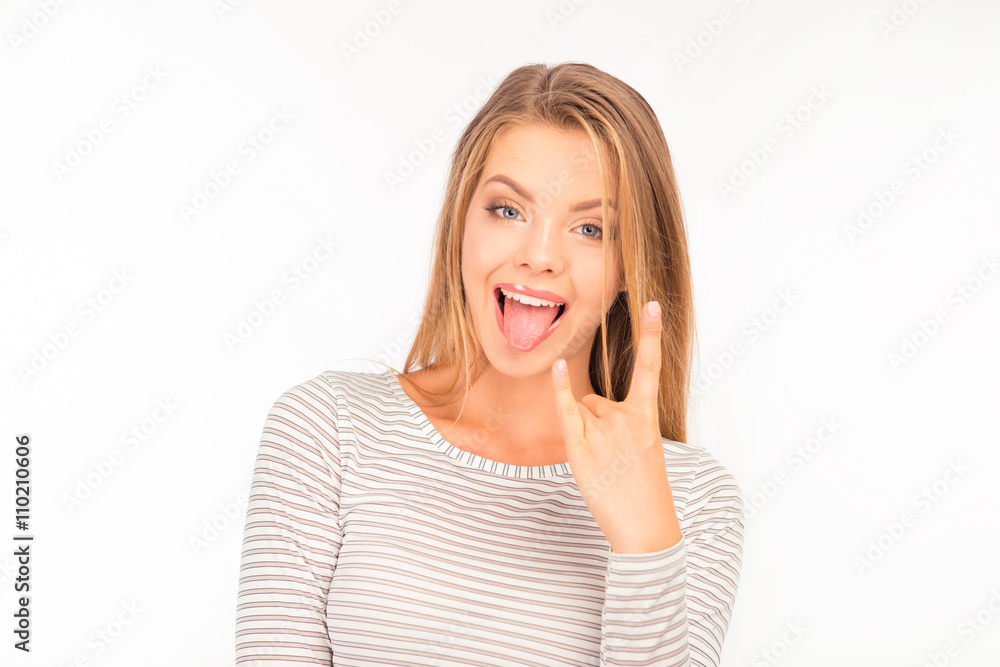 Rock and Roll. girl making a face and gesturing Rock and Roll. girl making a face and gesturing