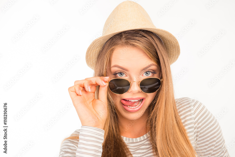 Fototapeta premium emotional funny girl with glasses and hat