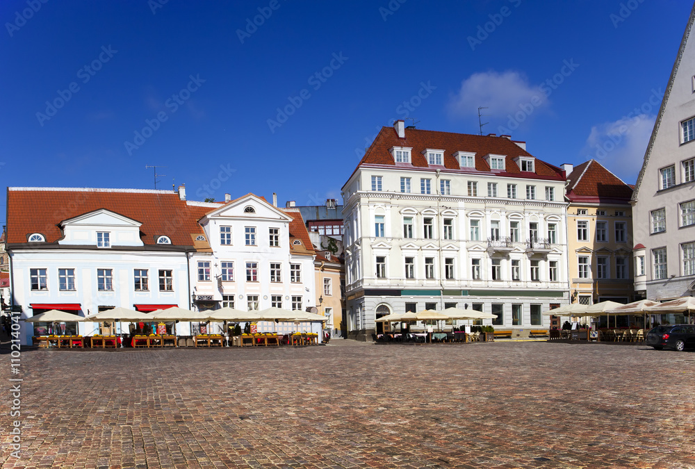 Old city, Tallinn, Estonia. Bright multicolor houses on the Town hall square...