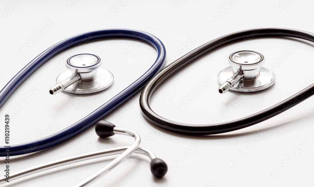 two disassembled stethoscope on white background two disassembled stethoscope on white background