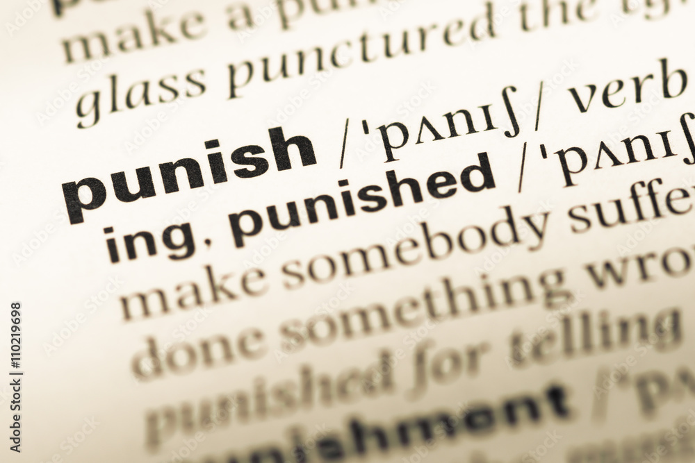 Close up of old English dictionary page with word punish Close up of old English dictionary page with word punish