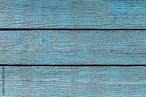 wood background. painted boards. applied light and color effects.