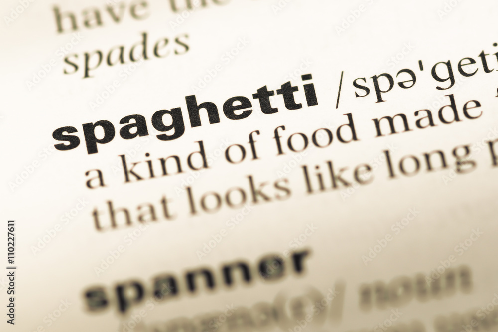 Close up of old English dictionary page with word spaghetti Close up of old English dictionary page with word spaghetti