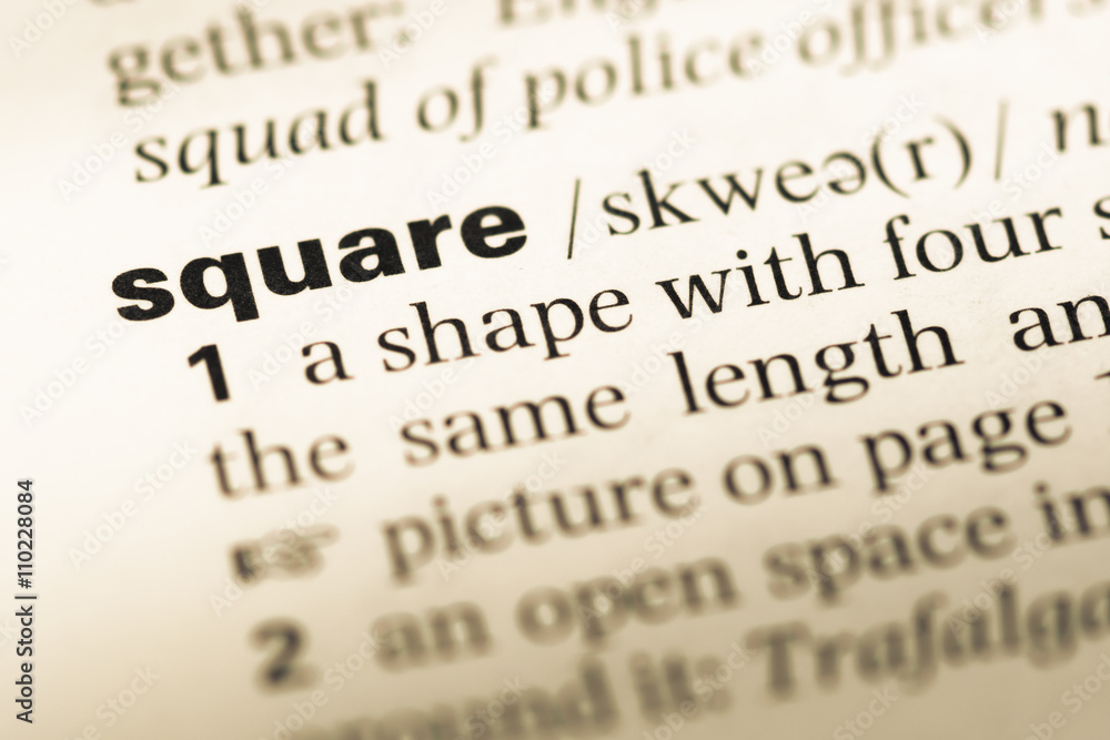 Close up of old English dictionary page with word square Close up of old English dictionary page with word square