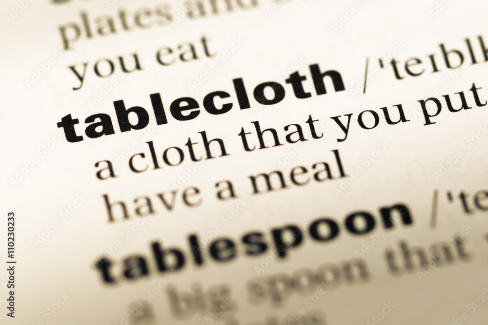 Close up of old English dictionary page with word tablecloth Close up of old English dictionary page with word tablecloth
