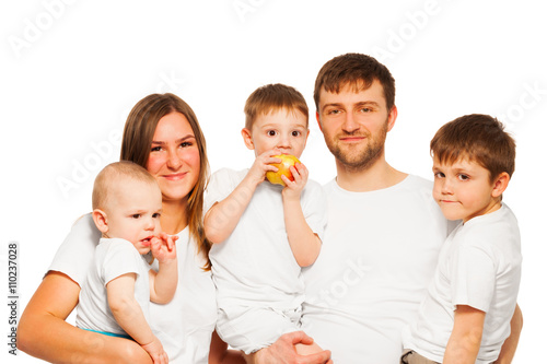 Big happy family wearing white blank t-shirts