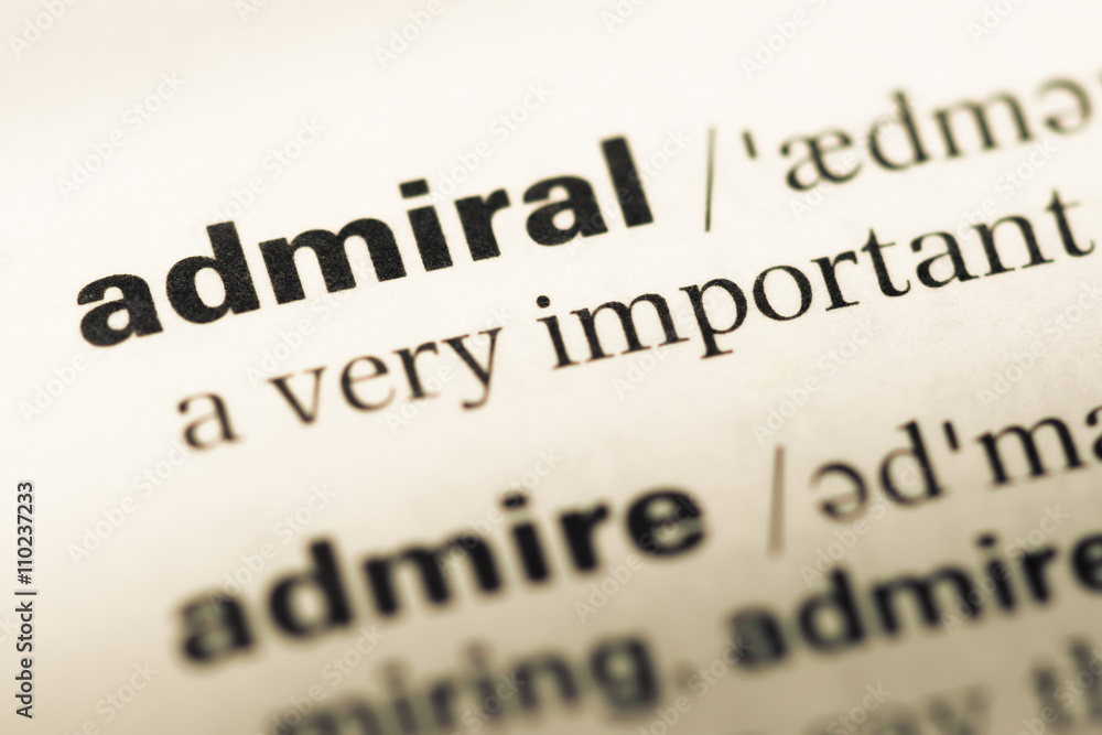 Close up of old English dictionary page with word admiral Close up of old English dictionary page with word admiral