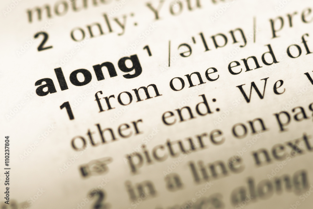 Obraz premium Close up of old English dictionary page with word along