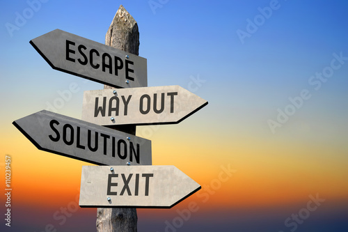 Escape, way out, solution, exit signpost photo