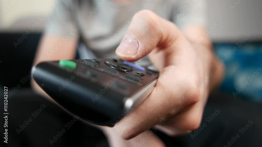 Switch Tv Remote Using a Tv remote control to switch between channels. Stock Video ...