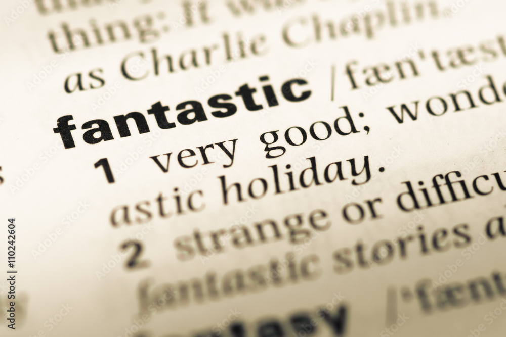 Close up of old English dictionary page with word fantastic Close up of old English dictionary page with word fantastic