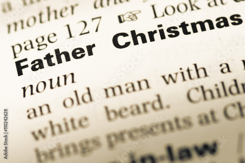 Close up of old English dictionary page with word Father Christm