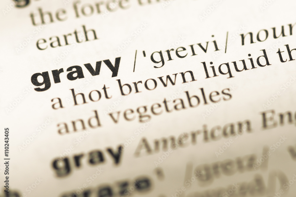 Close up of old English dictionary page with word gravy Close up of old English dictionary page with word gravy