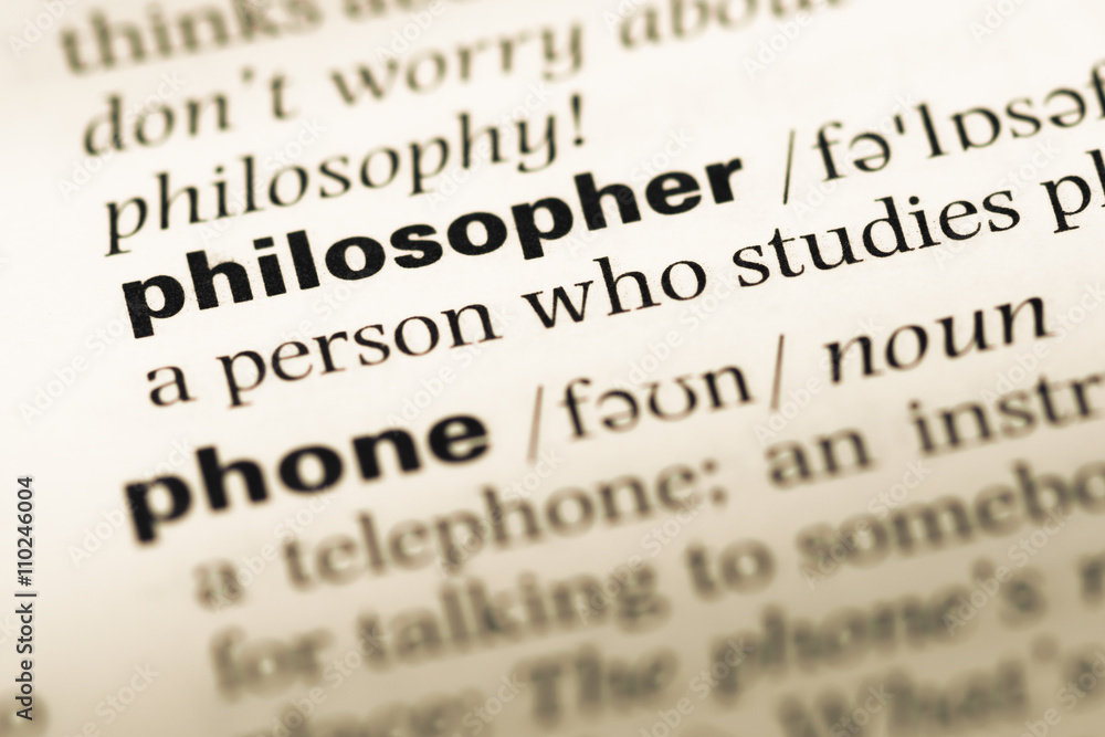 Close up of old English dictionary page with word philosopher Close up of old English dictionary page with word philosopher