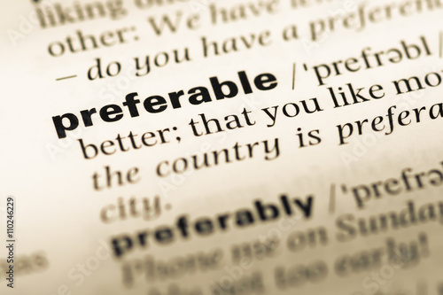 Close up of old English dictionary page with word preferable