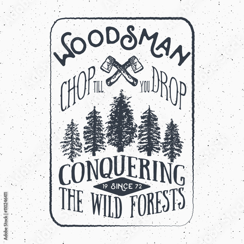 Lumberjack vintage label with two axes and trees. Hand drawn textured grunge vintage label, retro badge or T-shirt typography design, hipster T-shirt print design. Hand drawn vector illustration