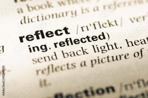 Принти на полотні Close up of old English dictionary page with word reflect