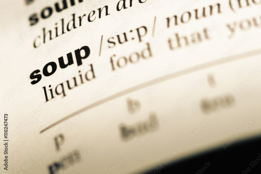 Close up of old English dictionary page with word soup Close up of old English dictionary page with word soup