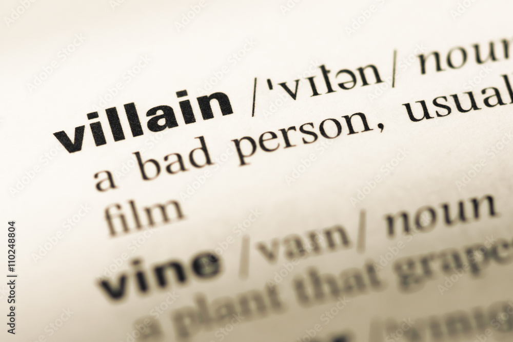 Close up of old English dictionary page with word villain Stock 写真