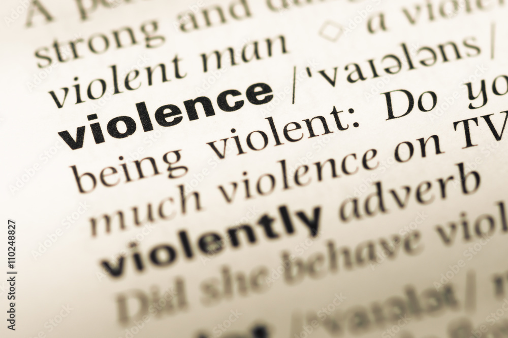 Close up of old English dictionary page with word violence Close up of old English dictionary page with word violence