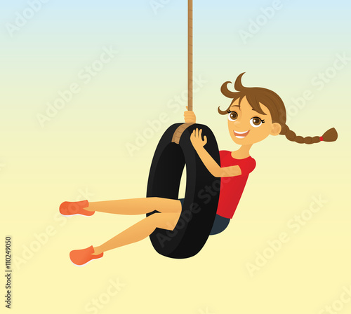 Girl in a tire swing