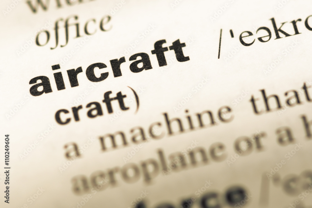 Close up of old English dictionary page with word aircraft Close up of old English dictionary page with word aircraft