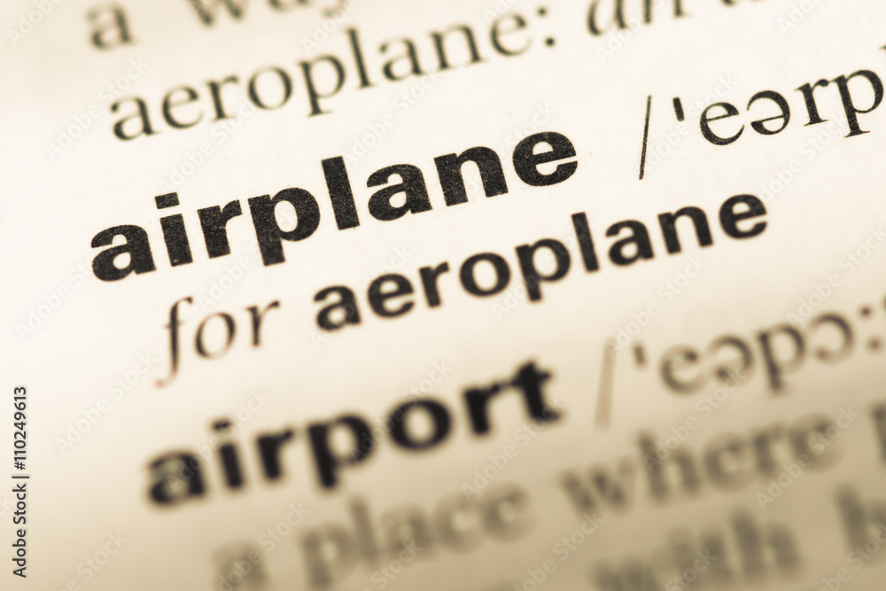 Close up of old English dictionary page with word airplane Close up of old English dictionary page with word airplane