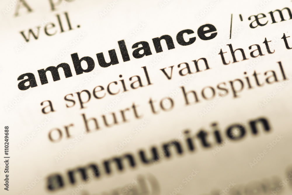 Close up of old English dictionary page with word ambulance Close up of old English dictionary page with word ambulance