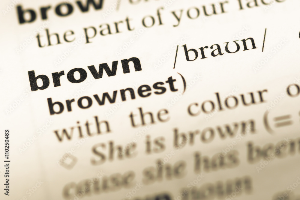 Close up of old English dictionary page with word brown Close up of old English dictionary page with word brown