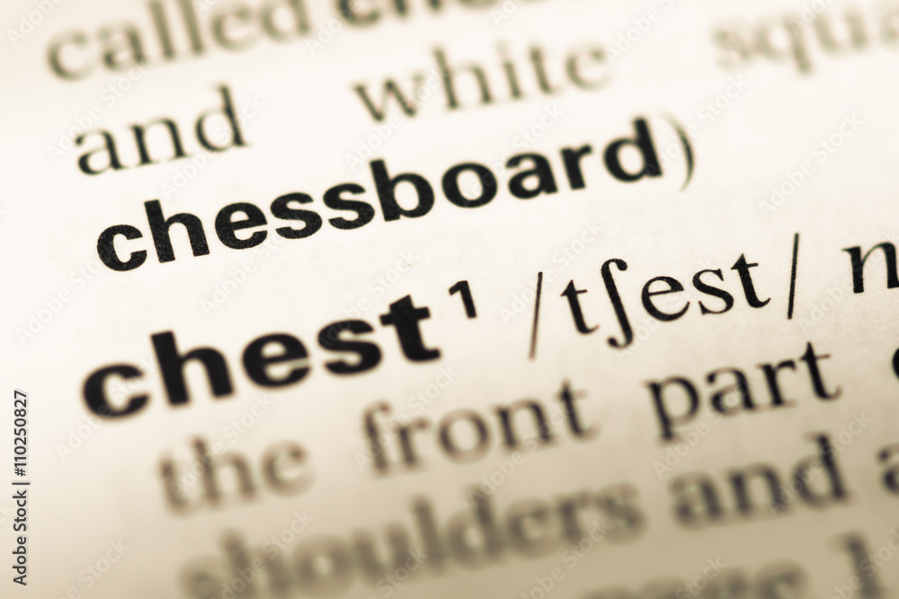 Close up of old English dictionary page with word chessboard Close up of old English dictionary page with word chessboard
