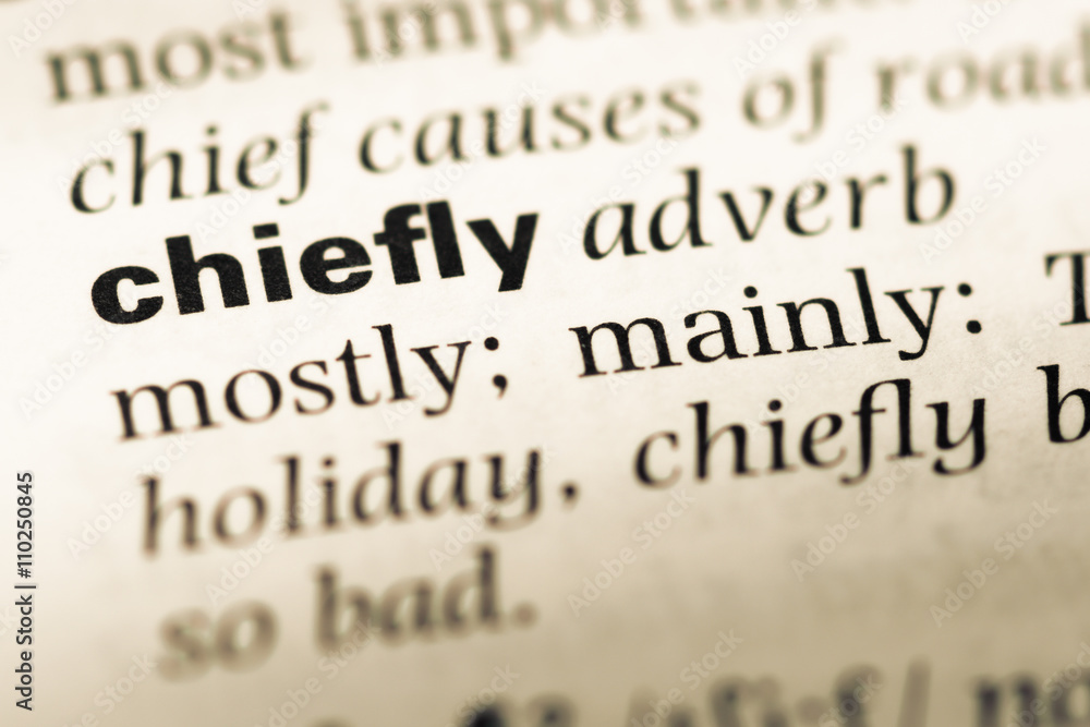 Close up of old English dictionary page with word chiefly Close up of old English dictionary page with word chiefly