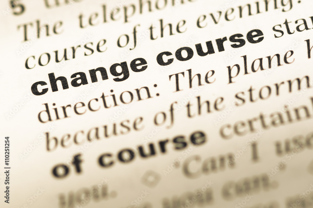 Close up of old English dictionary page with word change course Close up of old English dictionary page with word change course