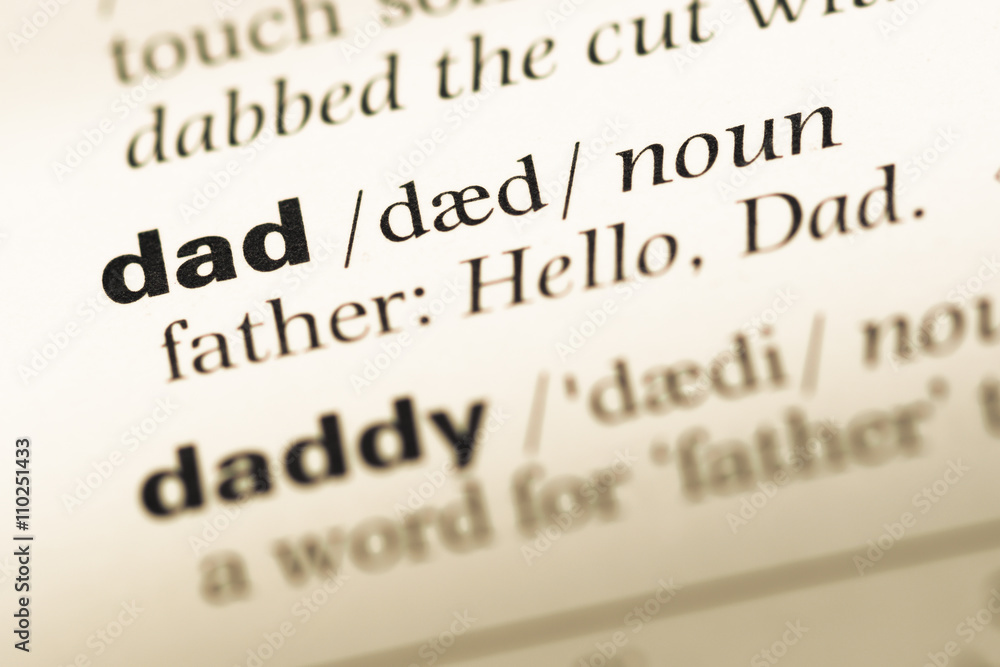 Close up of old English dictionary page with word dad Close up of old English dictionary page with word dad
