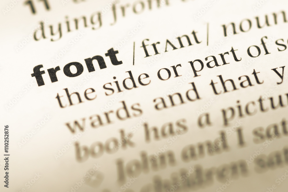 Fototapeta premium Close up of old English dictionary page with word front