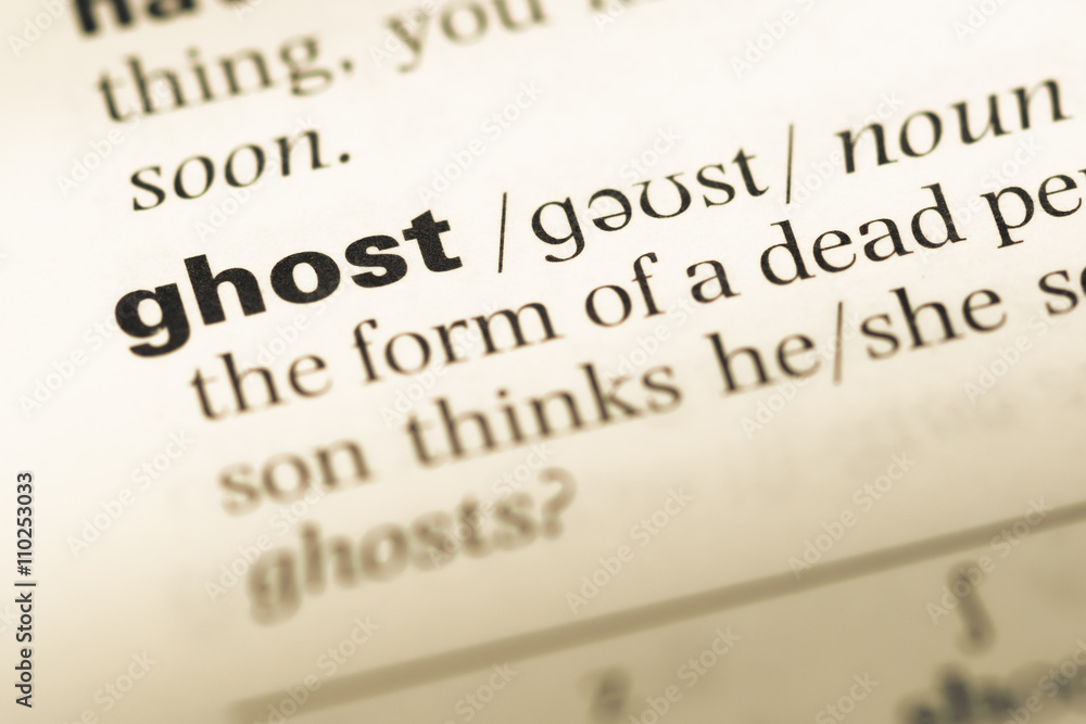 Close up of old English dictionary page with word ghost Close up of old English dictionary page with word ghost