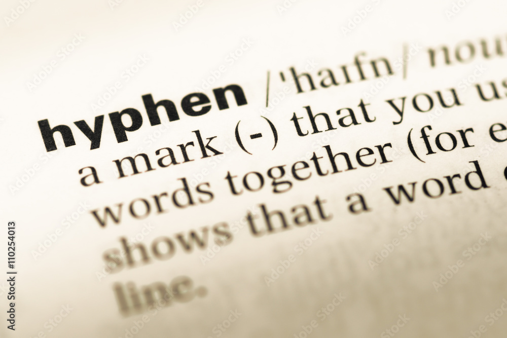 Close up of old English dictionary page with word hyphen Stock Photo