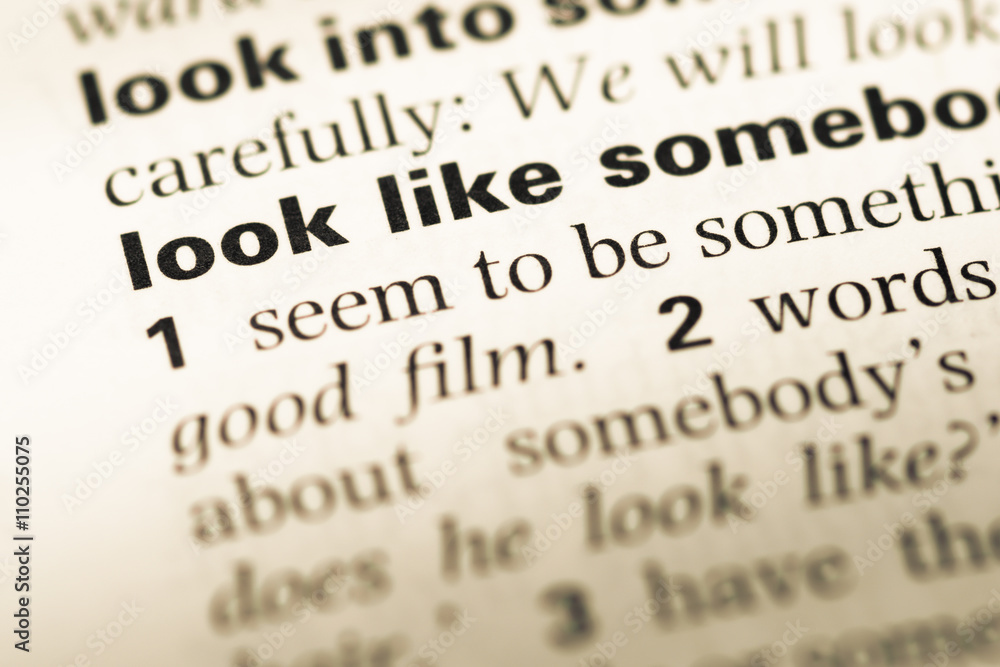 Close up of old English dictionary page with word look like Close up of old English dictionary page with word look like