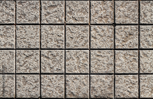gray stone tiles background with sun ray color