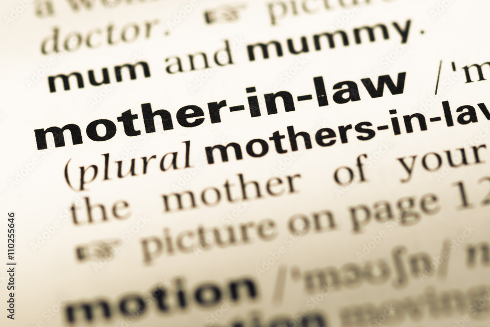Close up of old English dictionary page with word mother in law Close up of old English dictionary page with word mother in law