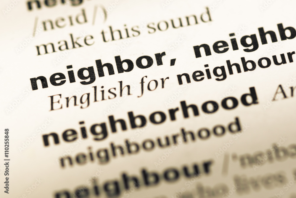 Obraz premium Close up of old English dictionary page with word neighbor