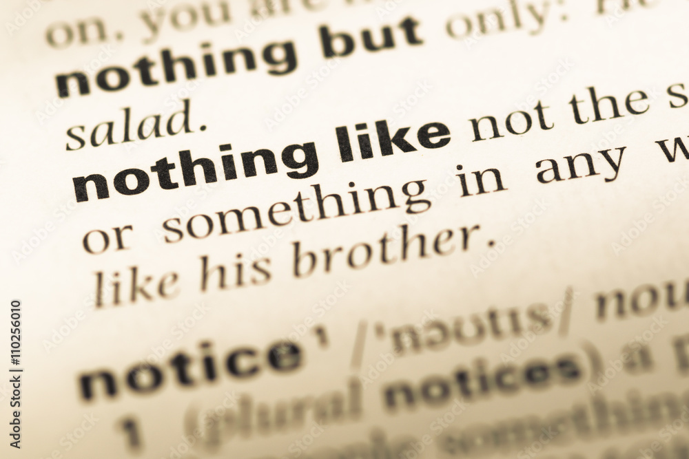 Close up of old English dictionary page with word nothing like Close up of old English dictionary page with word nothing like