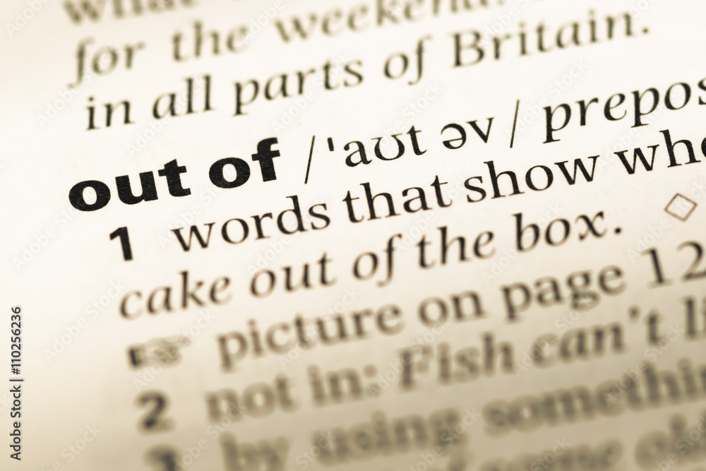 Close up of old English dictionary page with word out of Close up of old English dictionary page with word out of