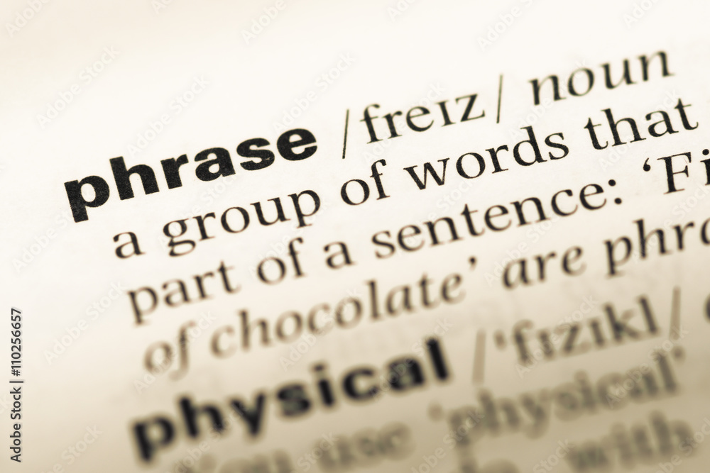 Close up of old English dictionary page with word phrase Close up of old English dictionary page with word phrase