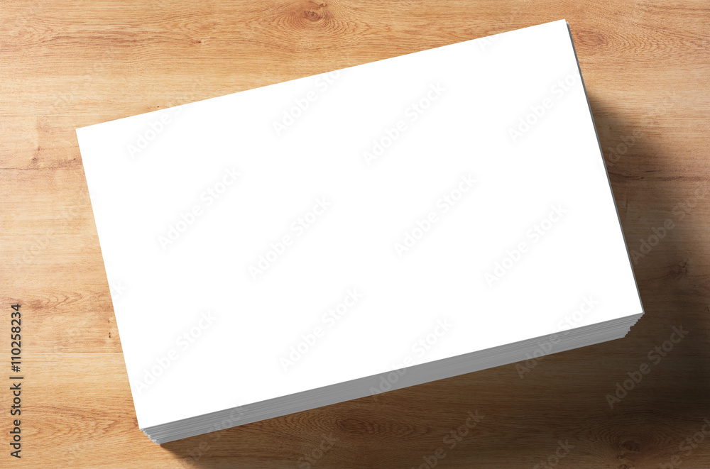 stack of white blank name card on wooden background stack of white blank name card on wooden background