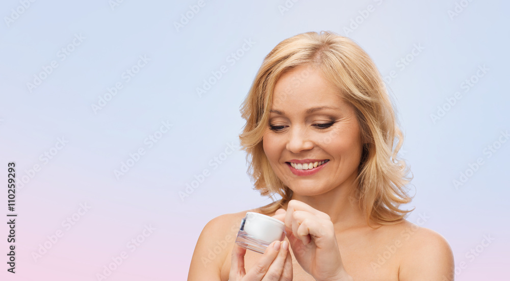 happy woman with cream jar