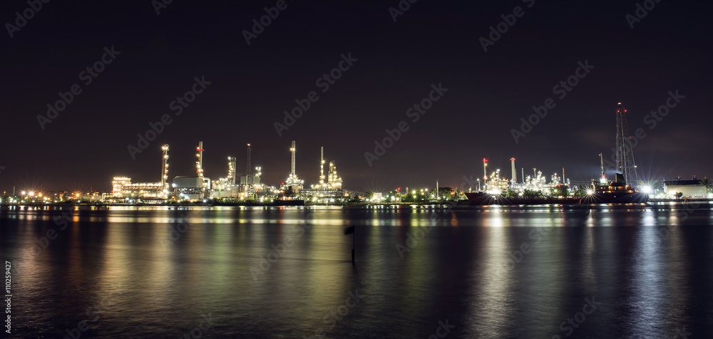Beautiful light of oil refinery factory in night time.
