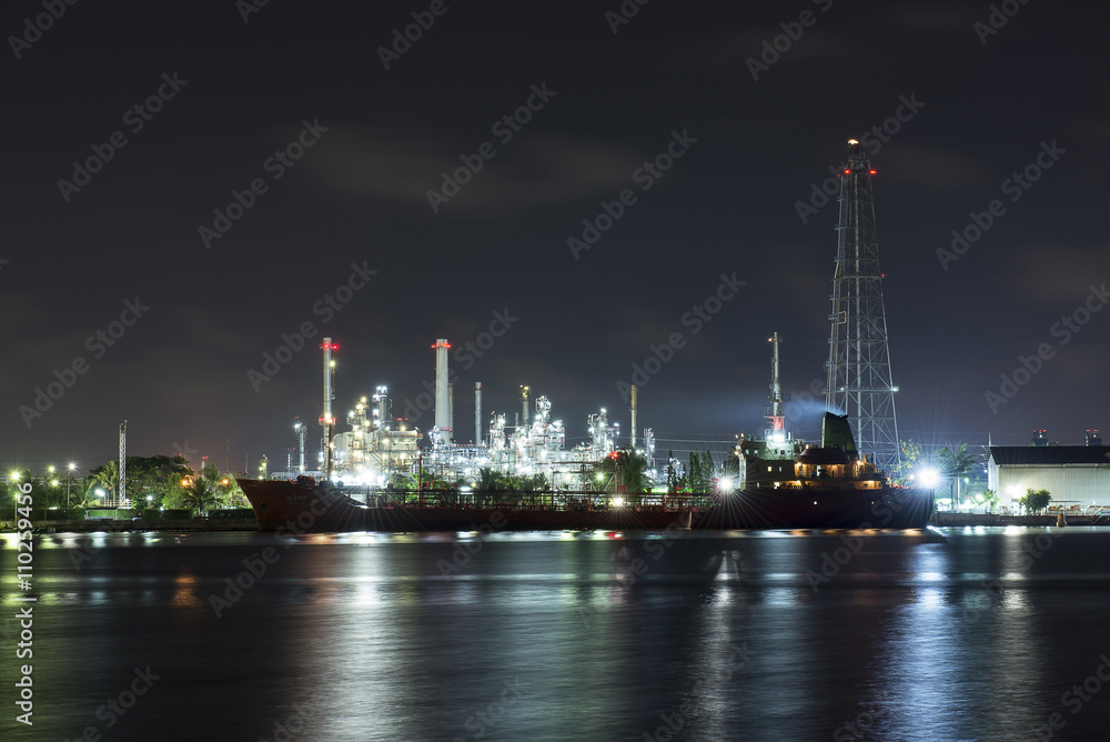 Beautiful light of oil refinery factory in night time. Beautiful light of oil refinery factory in night time.
